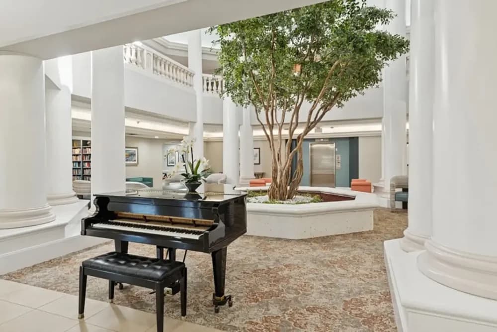 The Pointe at Deerfield — grand lobby atrium with baby grand piano